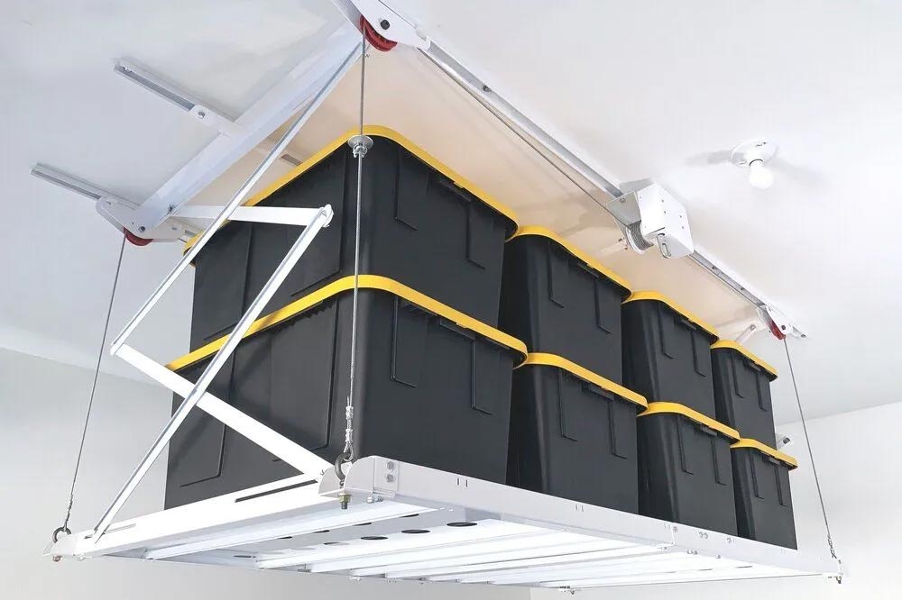 Overhead storage system holding black bins with yellow lids in a tidy grid layout